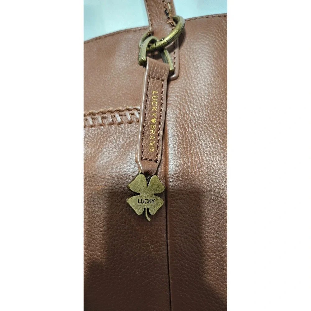 Lucky Brand Cognac Brown Pebbled Leather Tote Bag with Tassel and Clover Charm